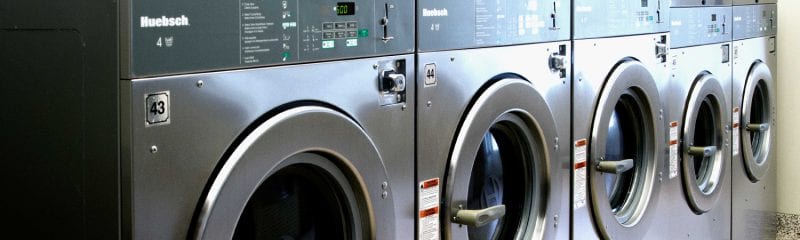 close up row of washing machines