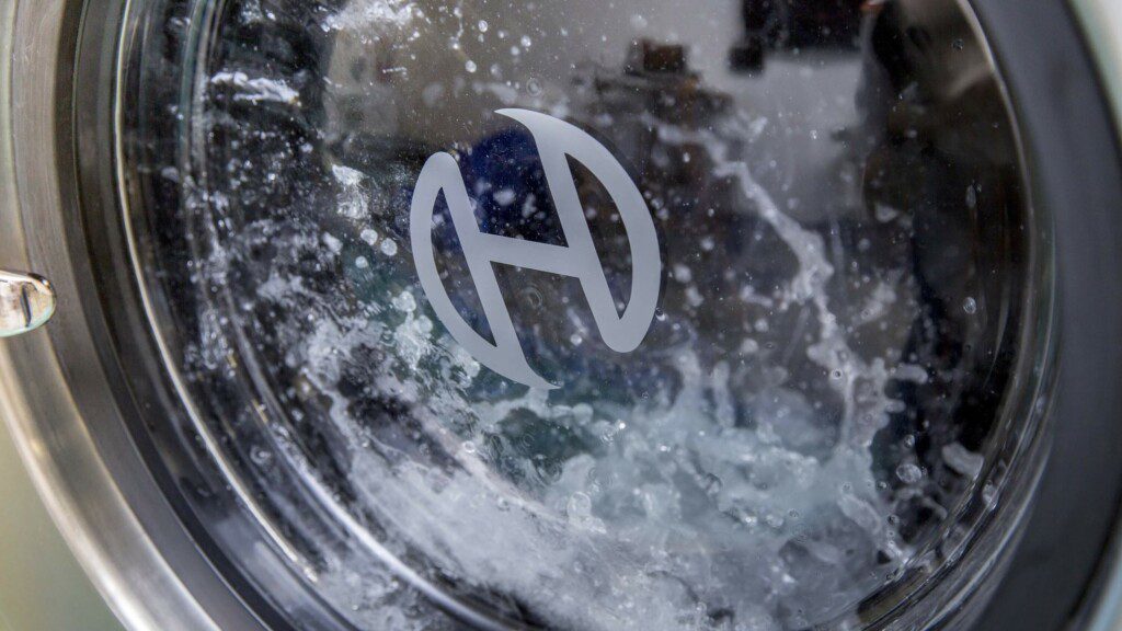 close up of Huebsch branded washing machine drum with water